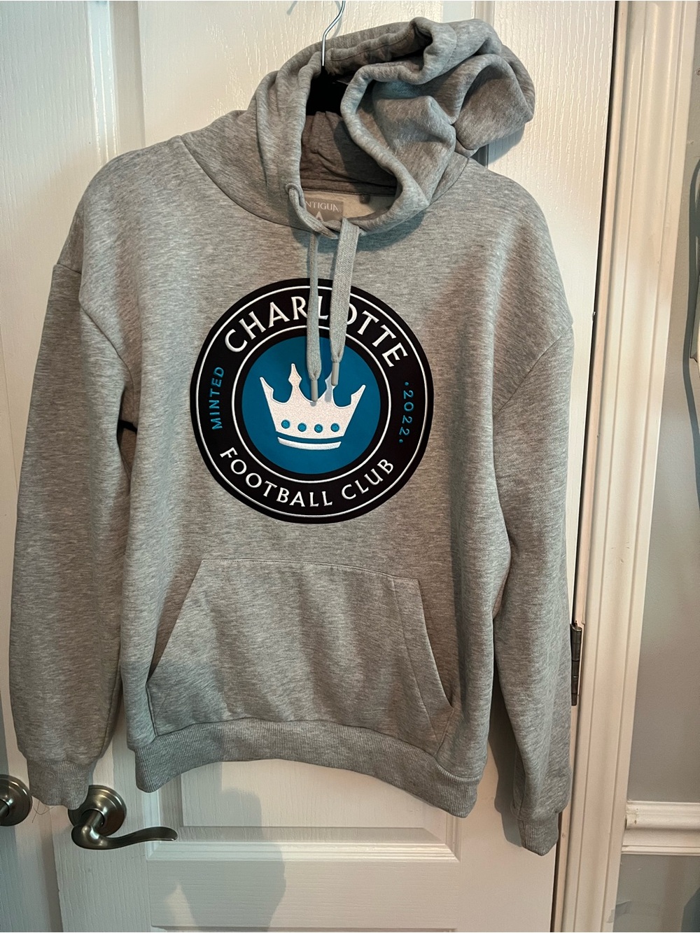 Antigua Gray Charlotte Football Club Hoodie with Blue and Black Club Emblem